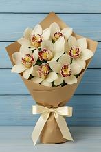 Букет 7 белых орхидей в Новороссийске Букет цветов из:  Орхидеи и Розы в Новороссийске